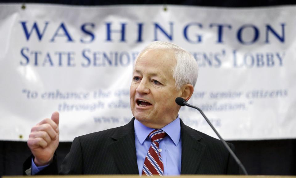 This photo taken Feb. 20, 2014 showsWashington state Insurance Commissioner Mike Kreidler speaking to seniors at an annual lobby day for the group in Olympia, Wash. Cancer patients relieved that they can get insurance coverage because of the new health care law may be disappointed to learn that some of the nation’s best cancer hospitals are off limits. Only four of 19 nationally recognized comprehensive cancer centers that responded to an Associated Press survey said patients have access through all the insurance companies in their state’s exchange, or primary market. (AP Photo/Elaine Thompson)