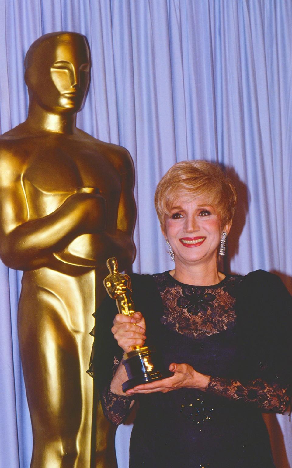Olympia Dukakis with her (soon to be stolen) Oscar in 1988 (Elisa Leonelli/Shutterstock)