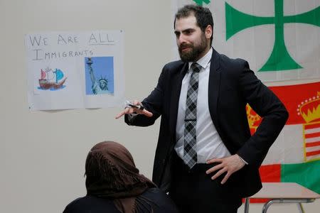 Nadeem Mazen, Cambridge city councillor, Muslim and founder of JetPAC, speaks to students in the AP Government class at Al-Noor Islamic high school in Mansfield, Massachusetts, U.S. February 2, 2017. REUTERS/Brian Snyder/Files