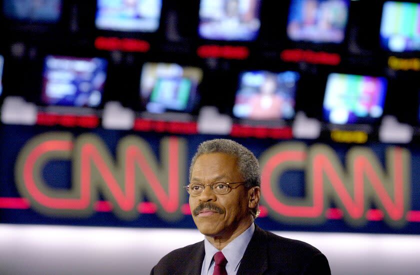A news anchor appears with a CNN logo behind him