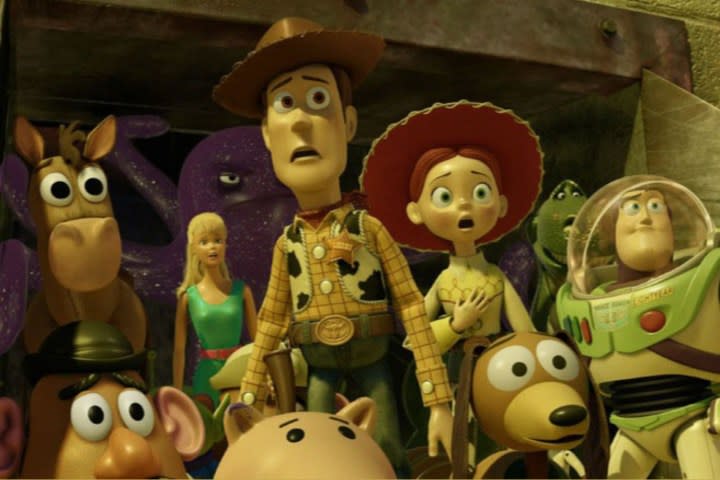 Several toys stare in horror in a scene from the Pixar film "Toy Story 3."