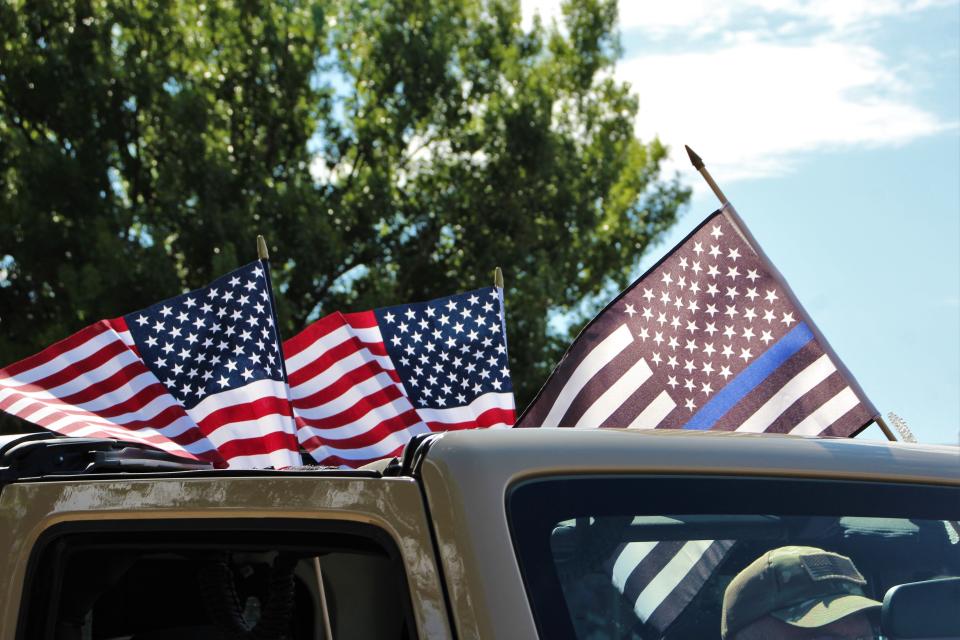 Flags were displayed everywhere at Monday's Independence Day parade through the Hillcrest neighborhood.