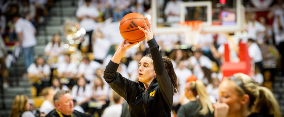 Iowa's Caitlin Clark (22) warms up before the Indiana versus Iowa women's basketball game at Simon Skjodt Assembly Hall on Thursday, Feb. 22, 2024.