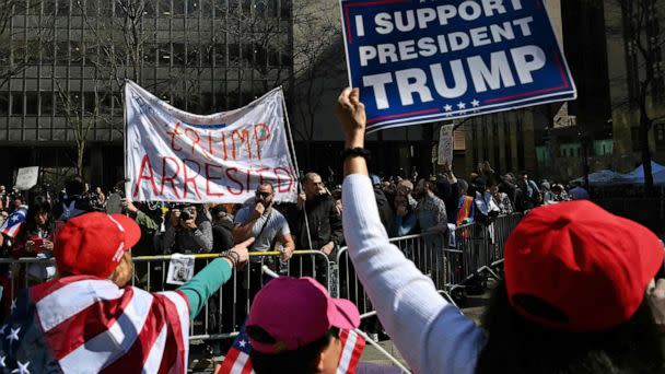 PHOTO: Supporters of former President Donald Trump argue with opponents outside the Manhattan District Attorney's office in New York City on April 4, 2023, ahead of Trump's expected appearance before a New York judge to answer criminal charges. (Angela Weiss/AFP via Getty Images)