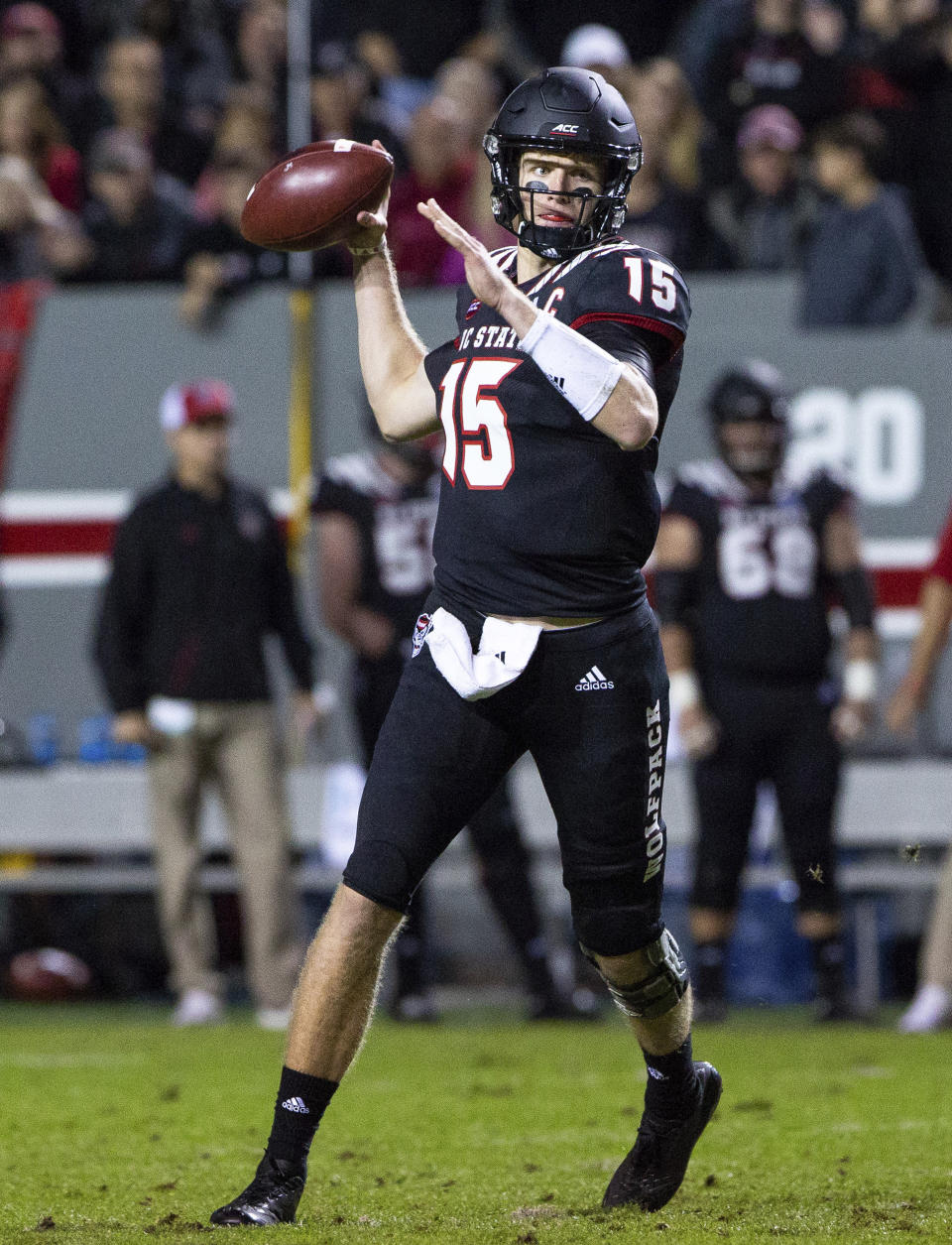 North Carolina State quarterback Ryan Finley (15) looks to pass during the first half of an NCAA college football game against Wake Forest in Raleigh, N.C., Thursday, Nov. 8, 2018. (AP Photo/Ben McKeown)