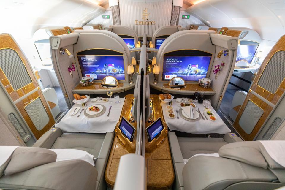 Prepared meals are displayed in the first class cabin of an Emirates Airbus SE A380-800 aircraft during the first day of the 16th Dubai Air Show on Sunday, November 17, 2019, at Dubai World Central (DWC) in Dubai, United Arab Emirates. (Christopher Pike/Bloomberg)