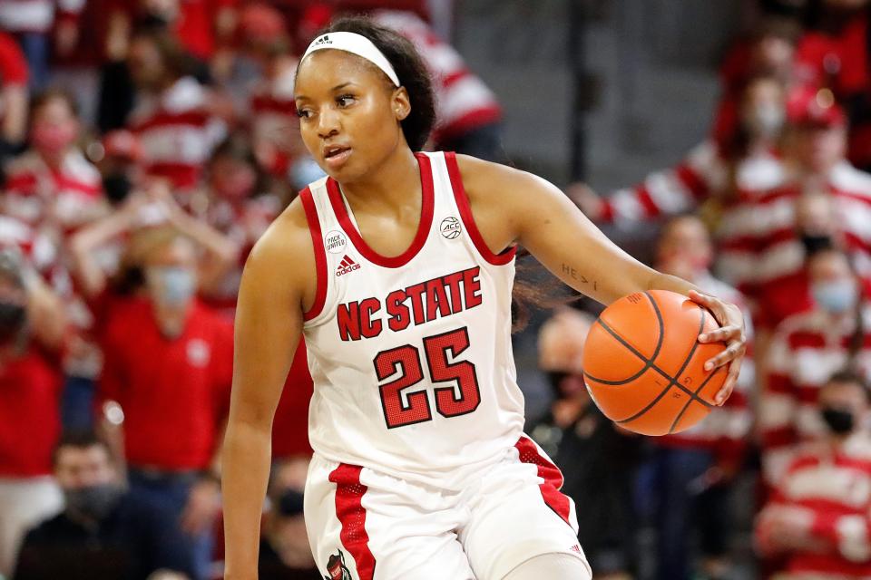 North Carolina State's Kayla Jones (25) moves the ball up the court against South Carolina during the second half of an NCAA college basketball game, Tuesday, Nov. 9, 2021 in Raleigh, N.C. (AP Photo/Karl B. DeBlaker)