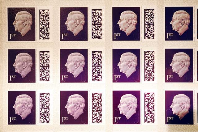 One of the first sheets of the 1st class definitive stamp featuring King Charles III goes on display at the Postal Museum in central London, before they enter circulation later this year 