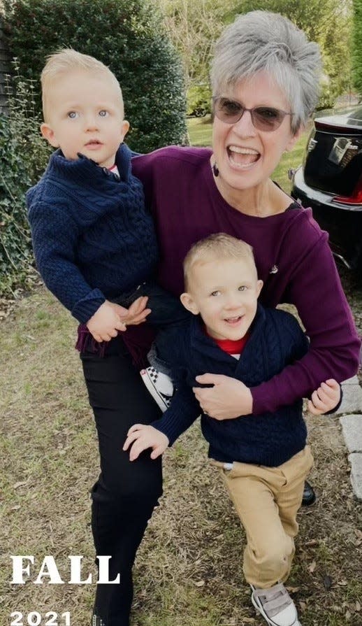 Andrea Thornley enjoys her two grandsons, Will, left, and Franky, center, in Bridgewater on Thanksgiving Day in 2021.