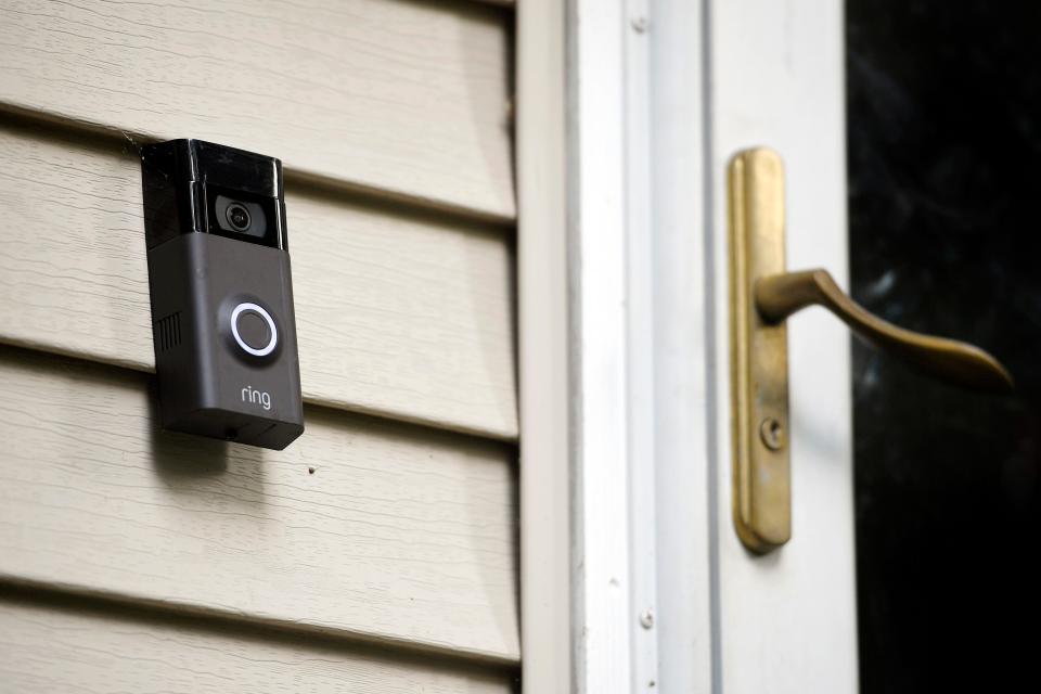 A Ring doorbell camera is seen installed outside a home in Wolcott, Conn., July 16, 2019. On Wednesday, Jan. 24, 2024, Amazon-owned Ring said it will stop allowing police departments to request doorbell camera footage from users, marking an end to a feature that has drawn criticism from privacy advocates.