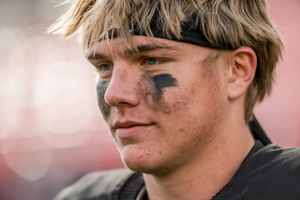 Corner Canyon QB Isaac Wilson is interviewed after his team’s win over Farmington in a 6A semifinal at Rice-Eccles Stadium.