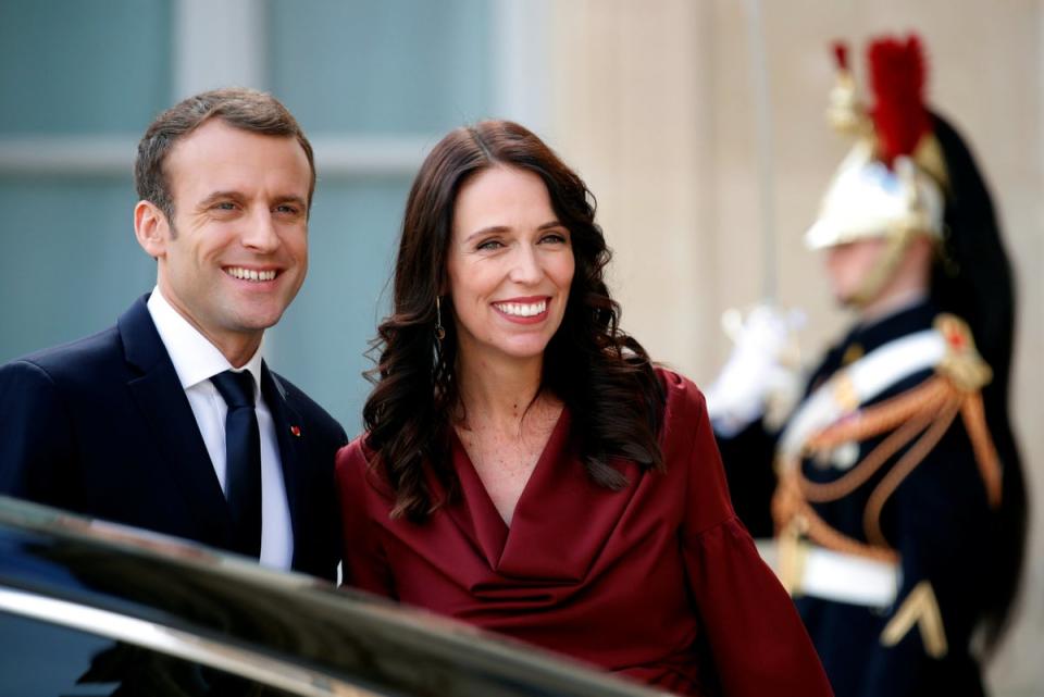 French President Emmanuel Macron poses next to New Zealand Prime Minister Jacinda Ardern as she leaves the Elysee Palace in Paris, France on 16 April 2018 (Reuters)