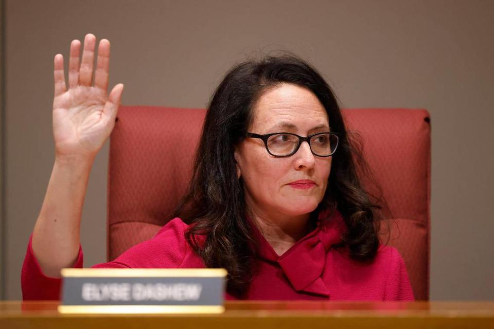 Elyse Dashew told The votes for herself as CMS school board chair at the Charlotte-Mecklenburg Government Center in Charlotte, N.C., Tuesday, Dec. 13, 2022.