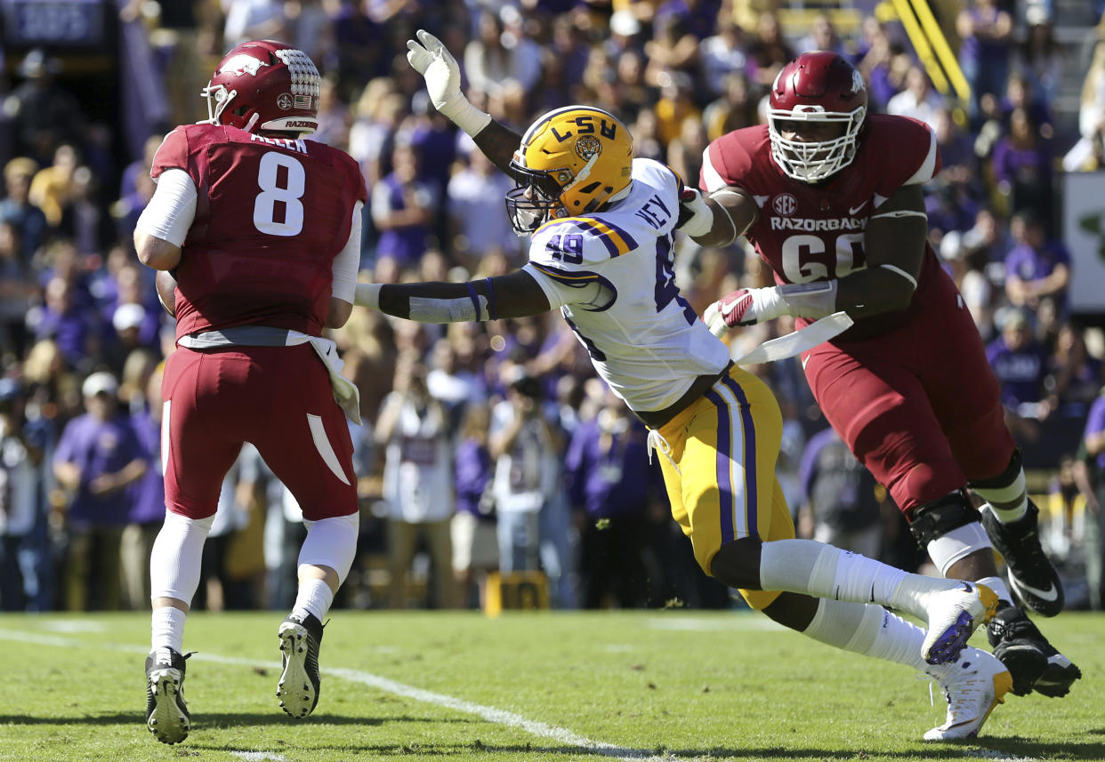 LSU pass rusher Arden Key (49) is moving on to the NFL. (AP Photo/Gerald Herbert)