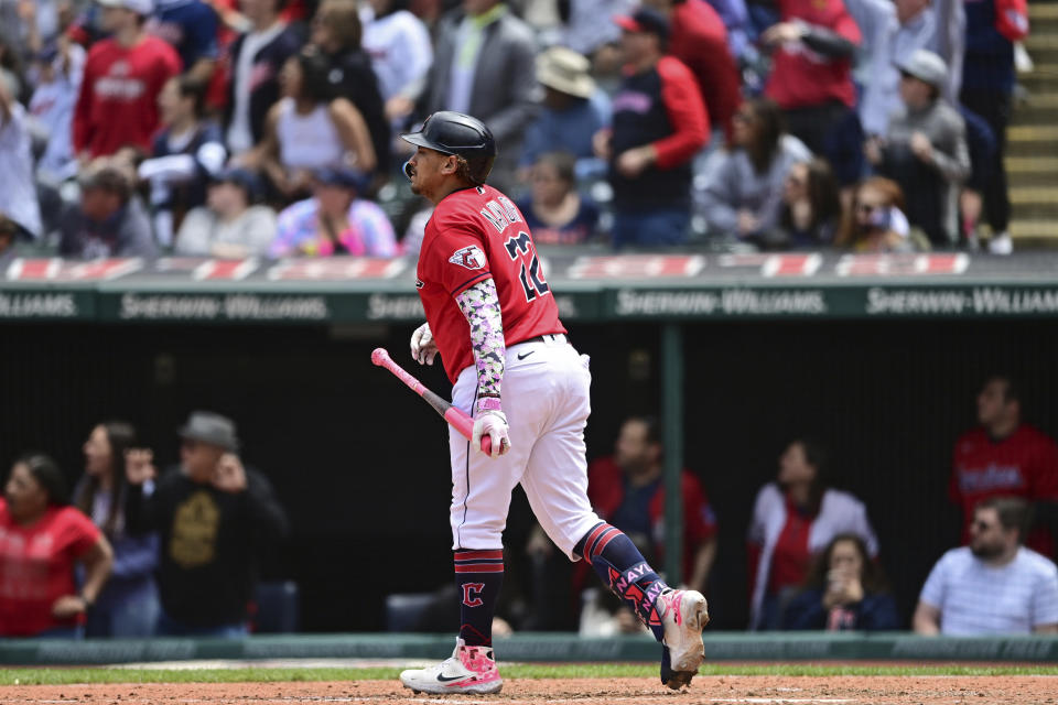 Cleveland Guardians' Josh Naylor watches his three-run home run off Los Angeles Angels relief pitcher Carlos Estevez during the eighth inning of a baseball game, Sunday, May 14, 2023, in Cleveland. (AP Photo/David Dermer)