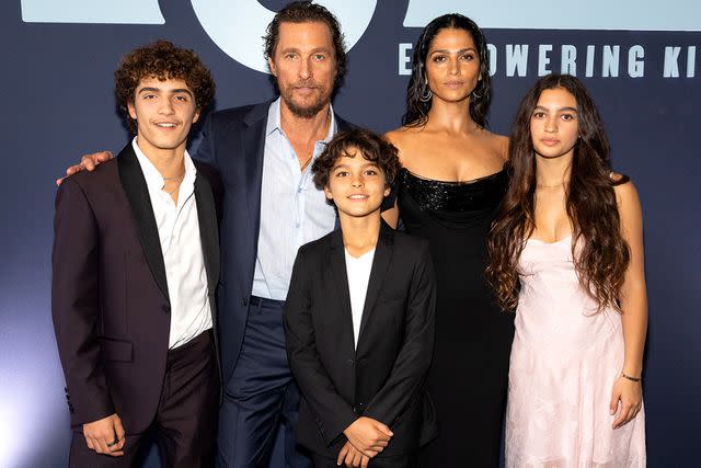 <p>Rick Kern/Getty Images</p> Levi McConaughey, Matthew McConaughey, Livingston McConaughey, Camila Alves McConaughey, and Vida McConaughey attend the 12th Annual Mack, Jack & McConaughey Gala