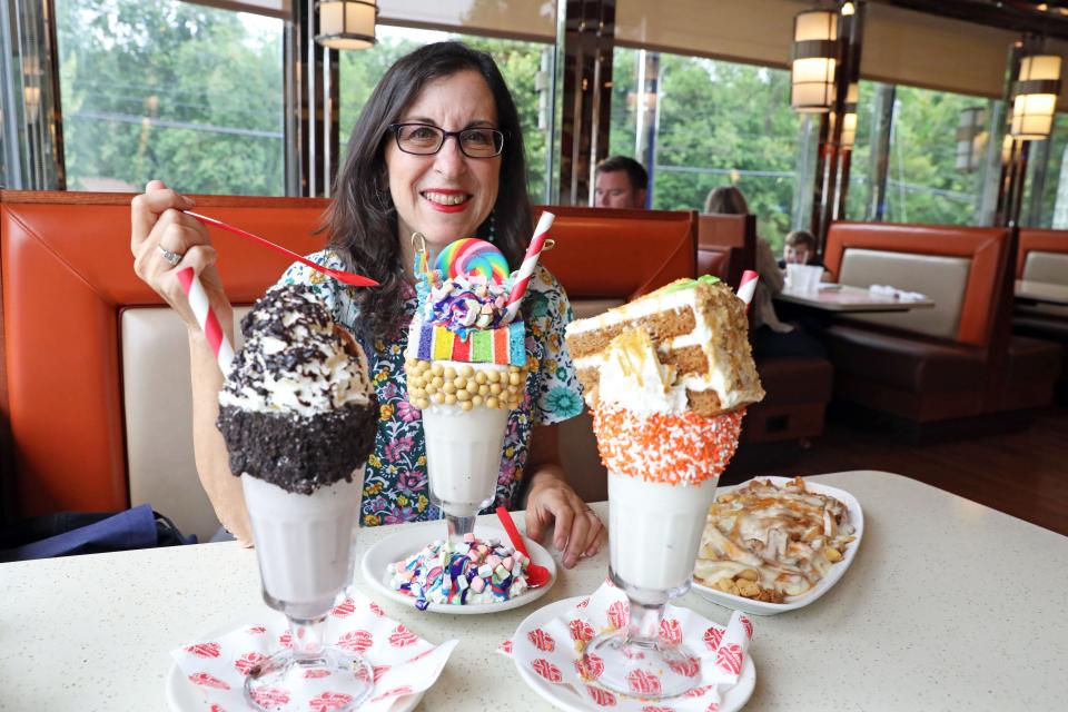 Lohud Food and Dining Reporter Jeanne Muchnick with the Oreo, Rainbow and Carrot Cake milkshakes at Orangetown Classic Diner in Orangeburg June 23, 2023.