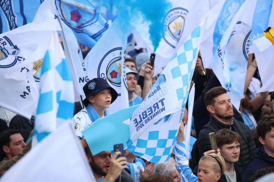 Victims lost £410 on average to ticket scams, according to Lloyds Bank. Photo: Phil Noble/ Reuters Soccer Football - Manchester City celebrate winning the Premier League - Manchester, Britain - May 23, 2022 Manchester City fans ahead of the victory parade REUTERS/Phil Noble