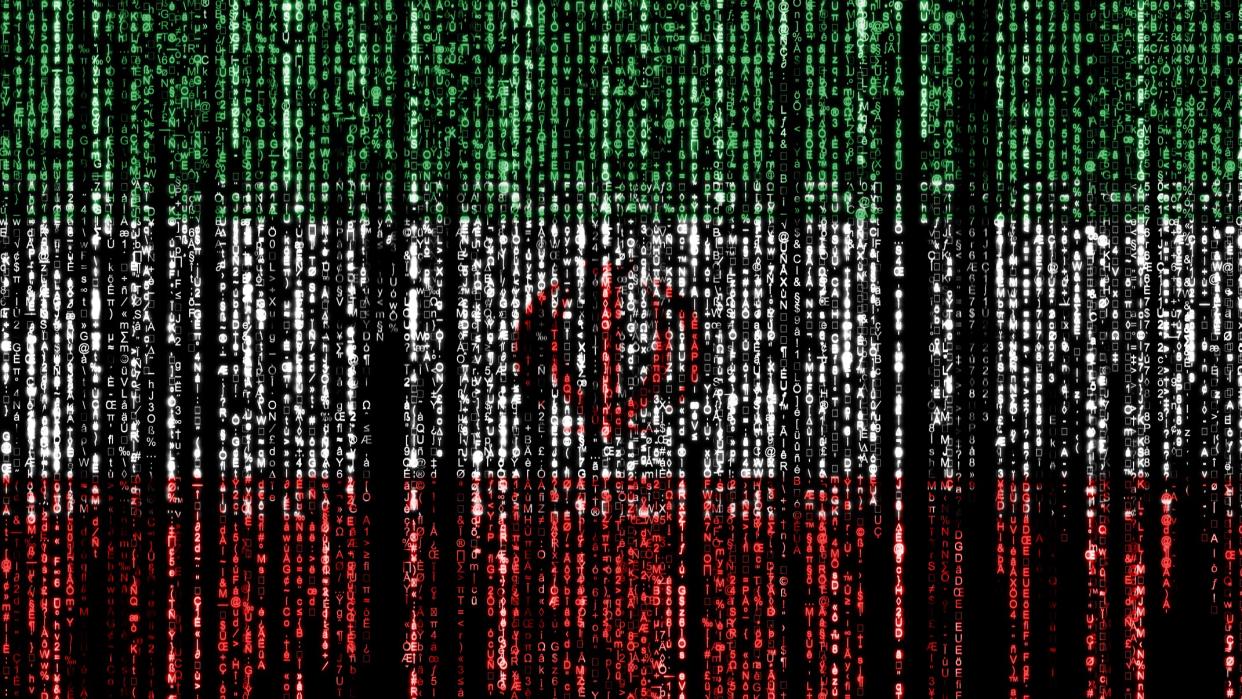  Flag of Iran on a computer binary codes falling from the top and fading away. 