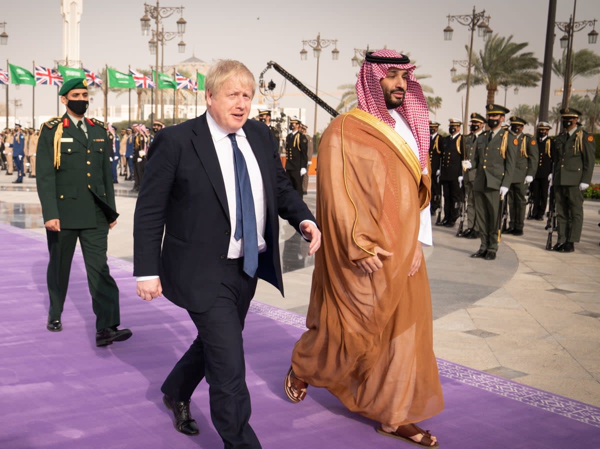 Boris Johnson is welcomed by Mohammed bin Salman, crown prince of Saudi Arabia, as he arrived for talks on a £1.6bn trade deal between the UK and six Gulf nations in March (PA)