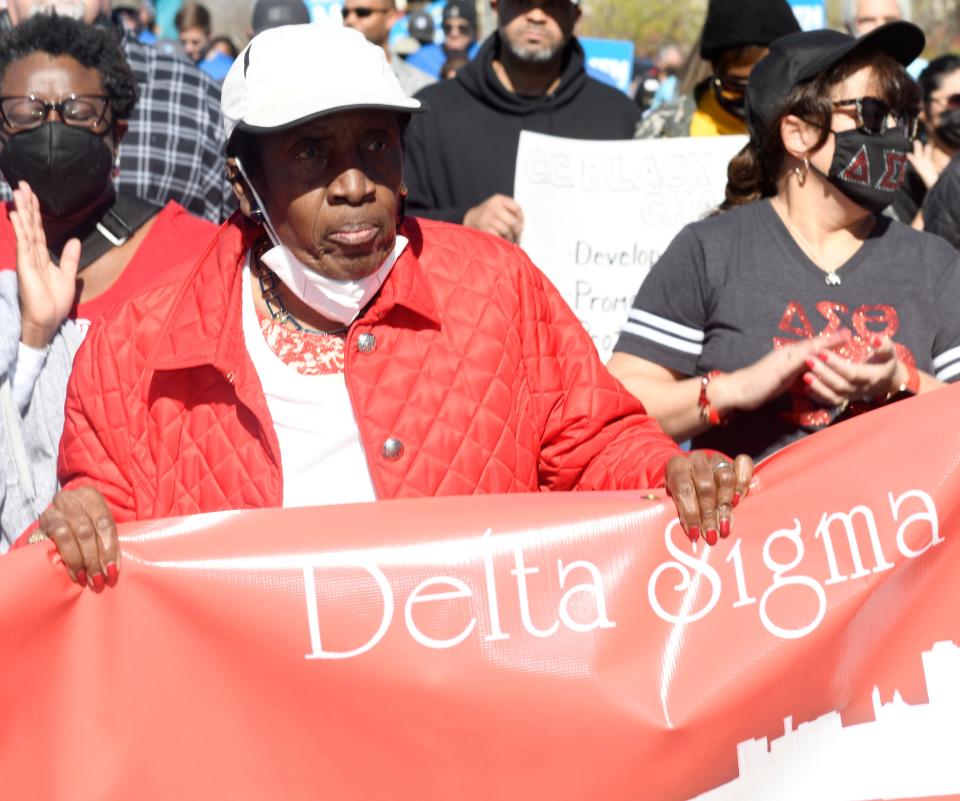 Gloria Scott walks during the annual Martin Luther King, Jr Day commemorative march, Monday, Jan. 17, 2022, at the Nueces County Courthouse. The march continued to the Church of the Good Shepherd. 