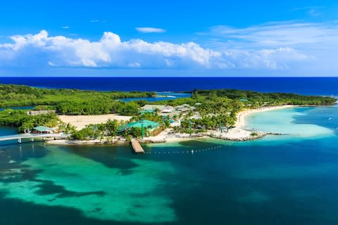 Roatan Bay, a Honduran island only four miles wide - Credit: AP