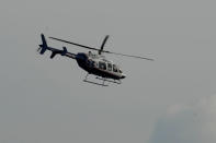 TALLADEGA, AL - MAY 05: Eric McClure, driver of the #14 Hefty/Reynolds Wrap Toyota, is air lifted by a medical team after an on track incident during the NASCAR Nationwide Series Aaron's 312 at Talladega Superspeedway on May 5, 2012 in Talladega, Alabama. (Photo by John Harrelson/Getty Images for NASCAR)