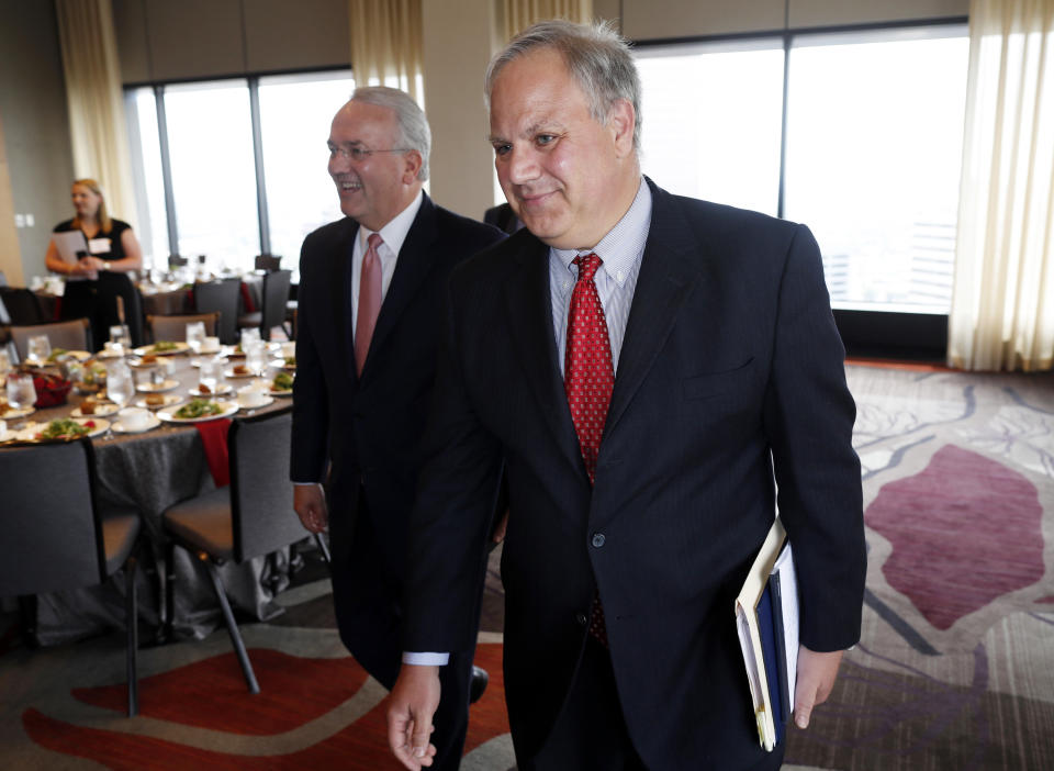 In this July 26, 2018 file photo, then- U.S. Deputy Secretary of the Interior David Bernhardt, foreground, and Jack Gerard, American Petroleum Institute president and chief executive officer, head up to speak during the annual state of Colorado energy luncheon sponsored by the Colorado Petroleum council in Denver. (Photo: ASSOCIATED PRESS)