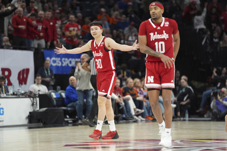 Nebraska guard Keisei Tominaga (30) celebrates after scoring during the second half of an NCAA college basketball game against Illinois in the semifinal round of the Big Ten Conference tournament, Saturday, March 16, 2024, in Minneapolis. (AP Photo/Abbie Parr)