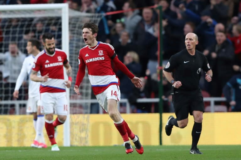 Middlesbrough's Dutch midfielder Marten de Roon (C) celebrates after scoring the opening goal of the English Premier League football match against Sunderland April 26, 2017
