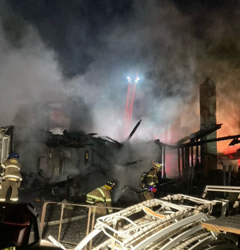 The house fire as firefighters worked to put out the flames. (Frederick County Fire and Rescue)