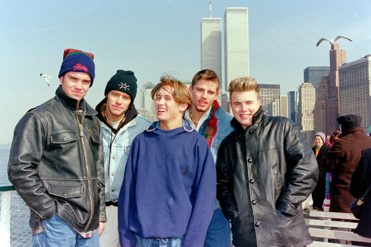 Mark Owen, Howard Donald, Gary Barlow, Robbie Williams and Jason Orange of Take That in New York 1995 (Photo by DaveHogan/Getty Images)