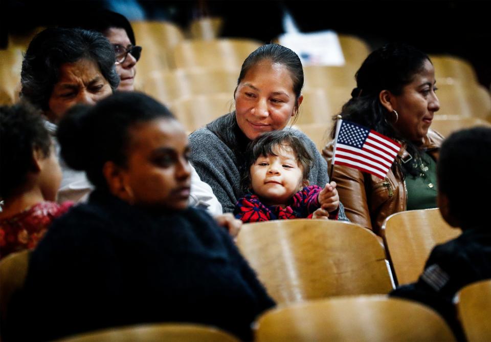 Roughly 300 individuals from 66 countries took the Oath of Allegiance during a mass Naturalization Ceremony at Kingsbury High School Tuesday afternoon. 