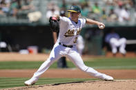 Oakland Athletics' JP Sears pitches against the Los Angeles Angels during the second inning of a baseball game in Oakland, Calif., Wednesday, Aug. 10, 2022. (AP Photo/Jeff Chiu)