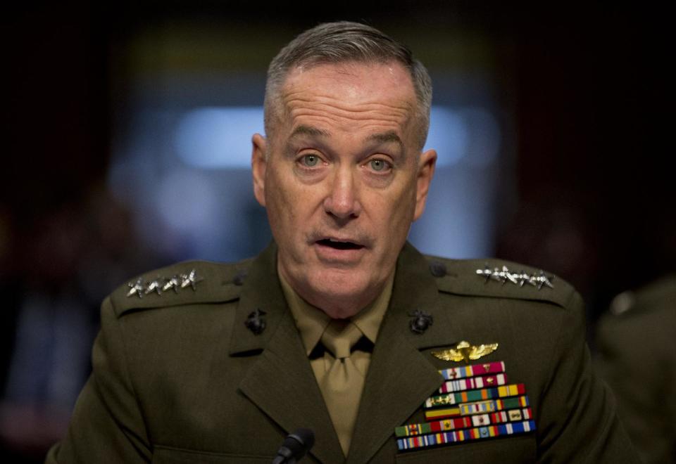 Marine Gen. Joseph F. Dunford, Jr., Commander, International Security Assistance Force, testifies on Capitol Hill in Washington, Wednesday, March 12, 2014, during a Senate Armed Services Committee on the situation in Afghanistan. President Barack Obama has threatened to withdraw all American forces from Afghanistan if a new security agreement is not signed by the end of the year, but there is no legal reason the U.S. has to resort to the "zero option," as administration officials have repeatedly claimed. (AP Photo/Carolyn Kaster)