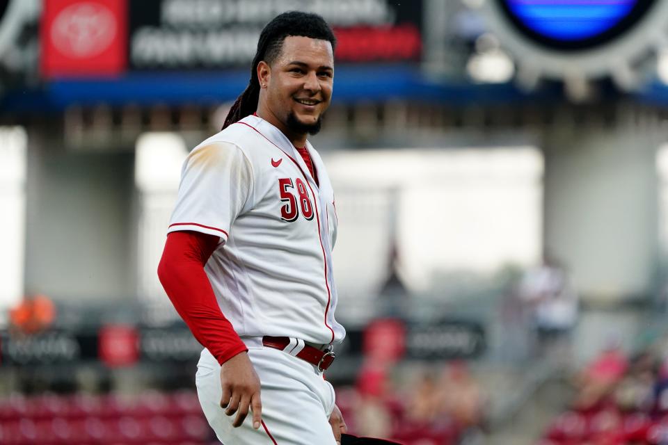 Cincinnati Reds starting pitcher Luis Castillo (58) smiles as he walks off the mound during the sixth inning of a baseball game against the Miami Marlins, Wednesday, July 27, 2022, at Great American Ball Park in Cincinnati. 