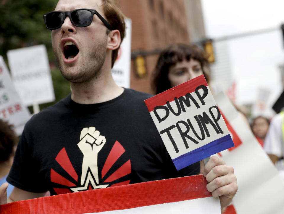 Demonstrators protest outside the RNC