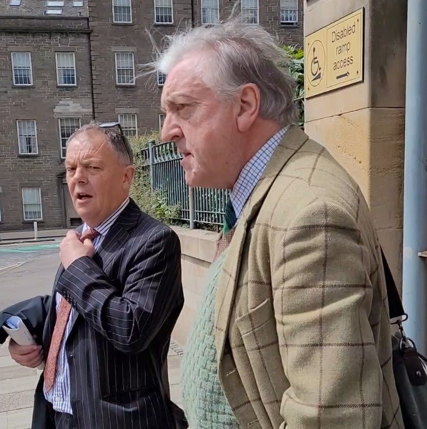 Lord Scrymgeour (R) leaving Dundee sheriff court on Monday