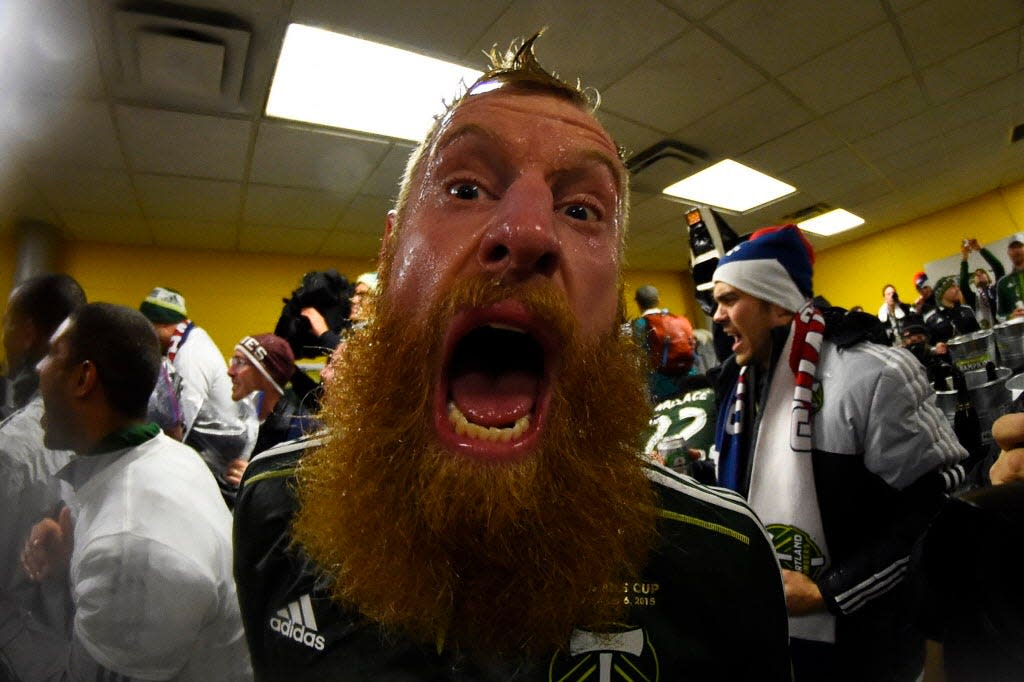 Nat Borchers celebrates in the locker room after the Portland Timbers won the 2015 MLS Cup.