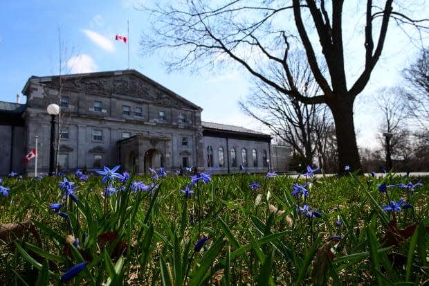 Spring flowers bloom as the Canada flag flies at half mast at  Rideau Hall, in Ottawa on Friday, April 9, 2021, following the death of Prince Philip. THE CANADIAN PRESS/Sean Kilpatrick