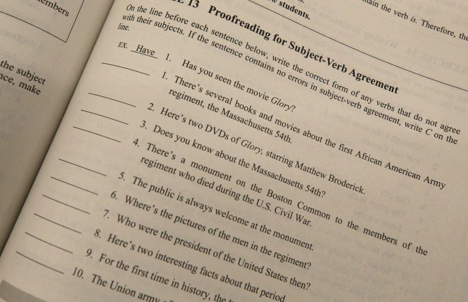 This eighth grade grammar practice book, part of APS' proposed curriculum, includes an exercise for proofreading for subject-verb agreement.