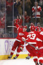 Detroit Red Wings right wing Lucas Raymond (23) celebrates his game-winning goal during overtime of an NHL hockey game against the Buffalo Sabres, Saturday, Nov. 27, 2021, in Detroit. (AP Photo/Duane Burleson)