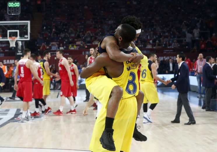 Former lottery pick Ekpe Udoh (8) returns from Europe a champion. (AP)
