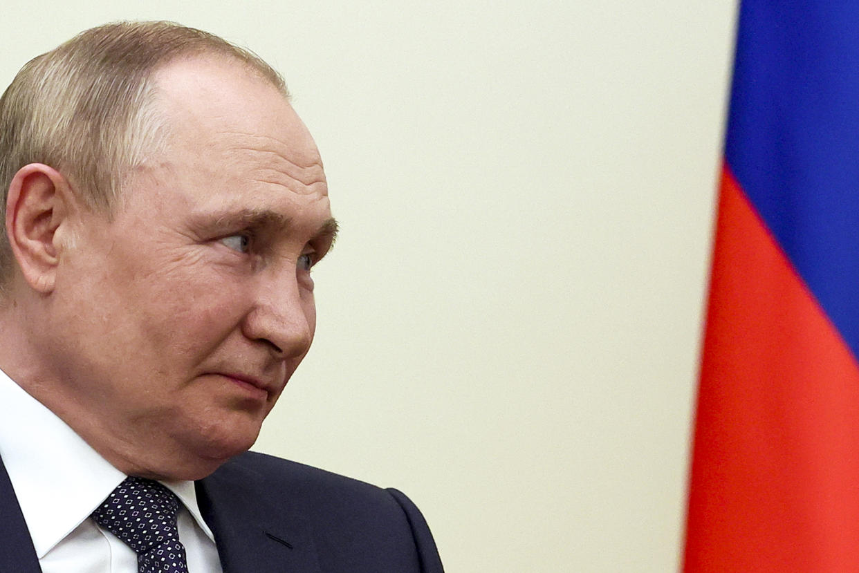 Russian President Vladimir Putin listens to Iranian President Ebrahim Raisi during their talks at the Saadabad palace, in Tehran, Iran, Tuesday, July 19, 2022. (Sergei Savostyanov, Sputnik, Kremlin Pool Photo via AP)