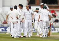 Britain Cricket - England v Pakistan - Second Test - Emirates Old Trafford - 25/7/16 England's Ben Stokes goes off injured Action Images via Reuters / Jason Cairnduff Livepic