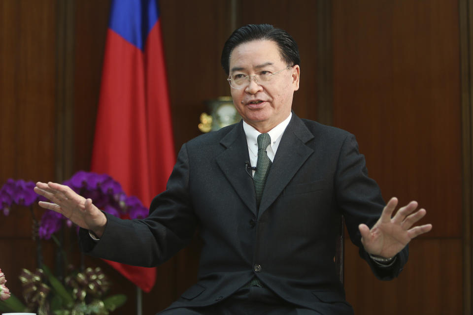 Taiwanese Foreign Minister Joseph Wu gestures while speaking during an exclusive interview with The Associated Press at his ministry in Taipei, Taiwan, Tuesday, Dec. 10, 2019. Wu was careful to say his government has no desire to intervene in Hong Kong’s internal affairs, and that existing legislation is sufficient to deal with a relatively small number of Hong Kong students or others who seek to reside in Taiwan. (AP Photo/Chiang Ying-ying)