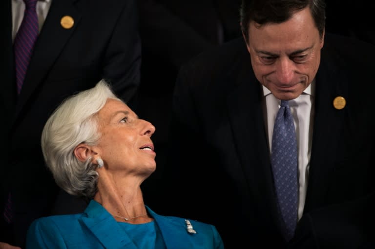 International Monetary Fund (IMF) managing-director Christine Lagarde speaks with president of the European Central Bank (ECB), Mario Draghi, during the G20 finance ministers' meeting in Chengdu, China's Sichuan province, on July 24, 2016