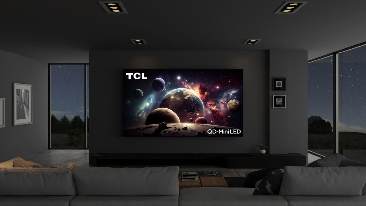  TCL QM89 QD Mini LED TV on living room wall. 