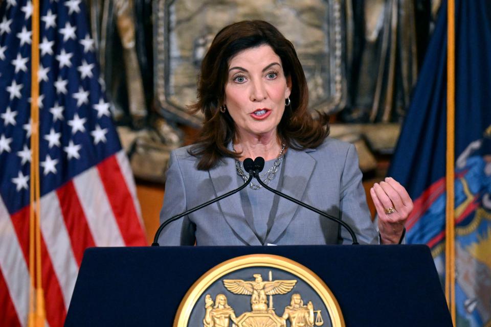 New York Gov. Kathy Hochul speaks to reporters in the Red Room at the state Capitol in Albany.