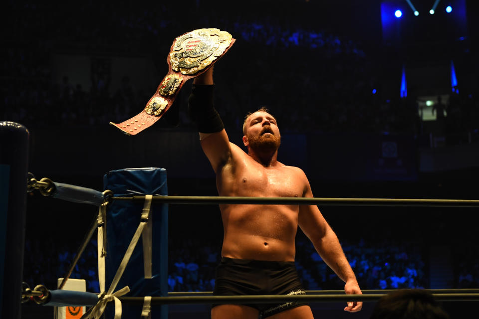 TOKYO, JAPAN – AUGUST 12:Jon Moxley lifts the belt during the New Japan Pro-Wrestling G1 Climax 29 at Nippon Budokan on August 12, 2019 in Tokyo, Japan.(Photo by Etsuo Hara/Getty Images)